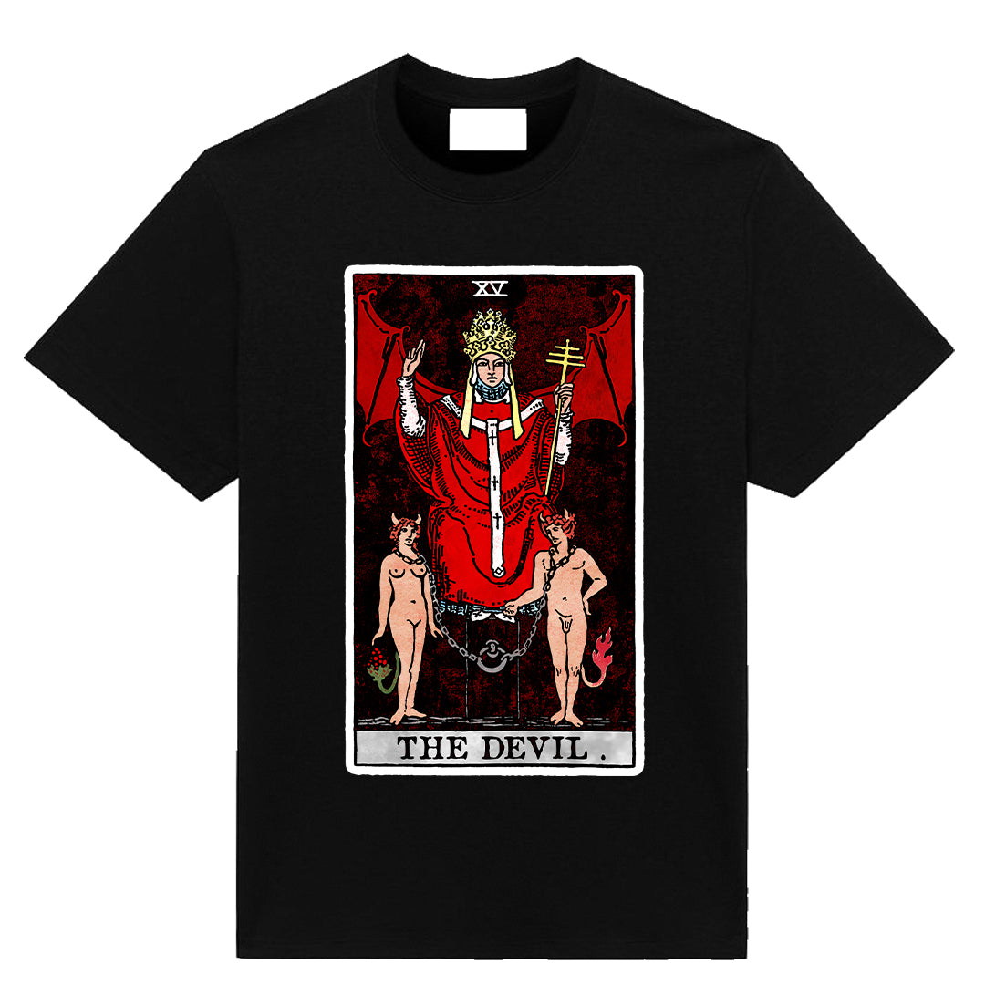 Black t-shirt featuring The Devil tarot card artwork with red and black occult imagery inspired by classic tarot symbolism.