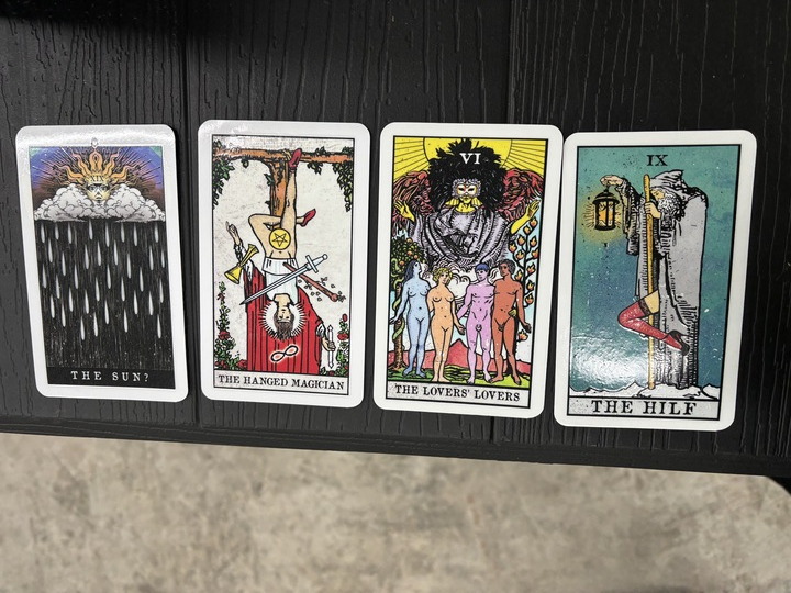 Four Neesh Labs tarot card stickers featuring The Hilf, The Lover’s Lovers, The Sun?, and The Hanged Magician, printed as waterproof vinyl decals