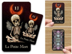 Arcanaless II La Petite Mort card showing the illustrated front, card back and size in hand