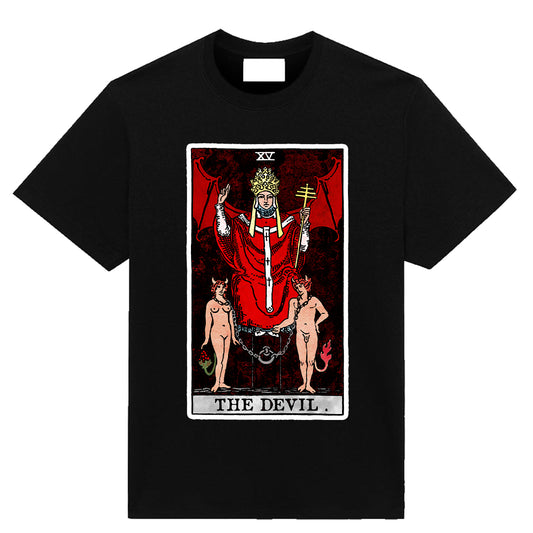 Black t-shirt featuring The Devil tarot card artwork with red and black occult imagery inspired by classic tarot symbolism.