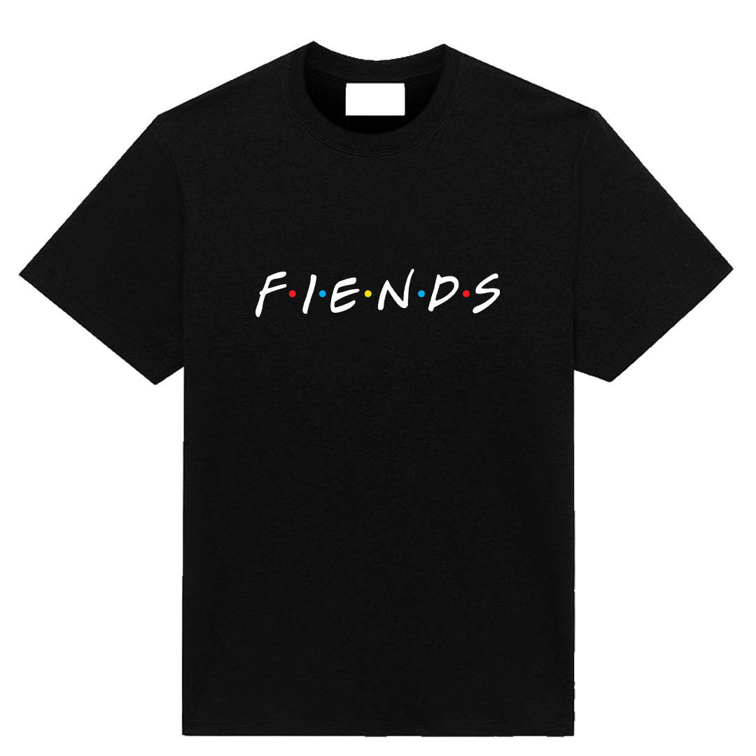 Black t-shirt featuring the word “Fiends” styled like a classic sitcom logo, blending horror punk attitude with pop-culture parody.