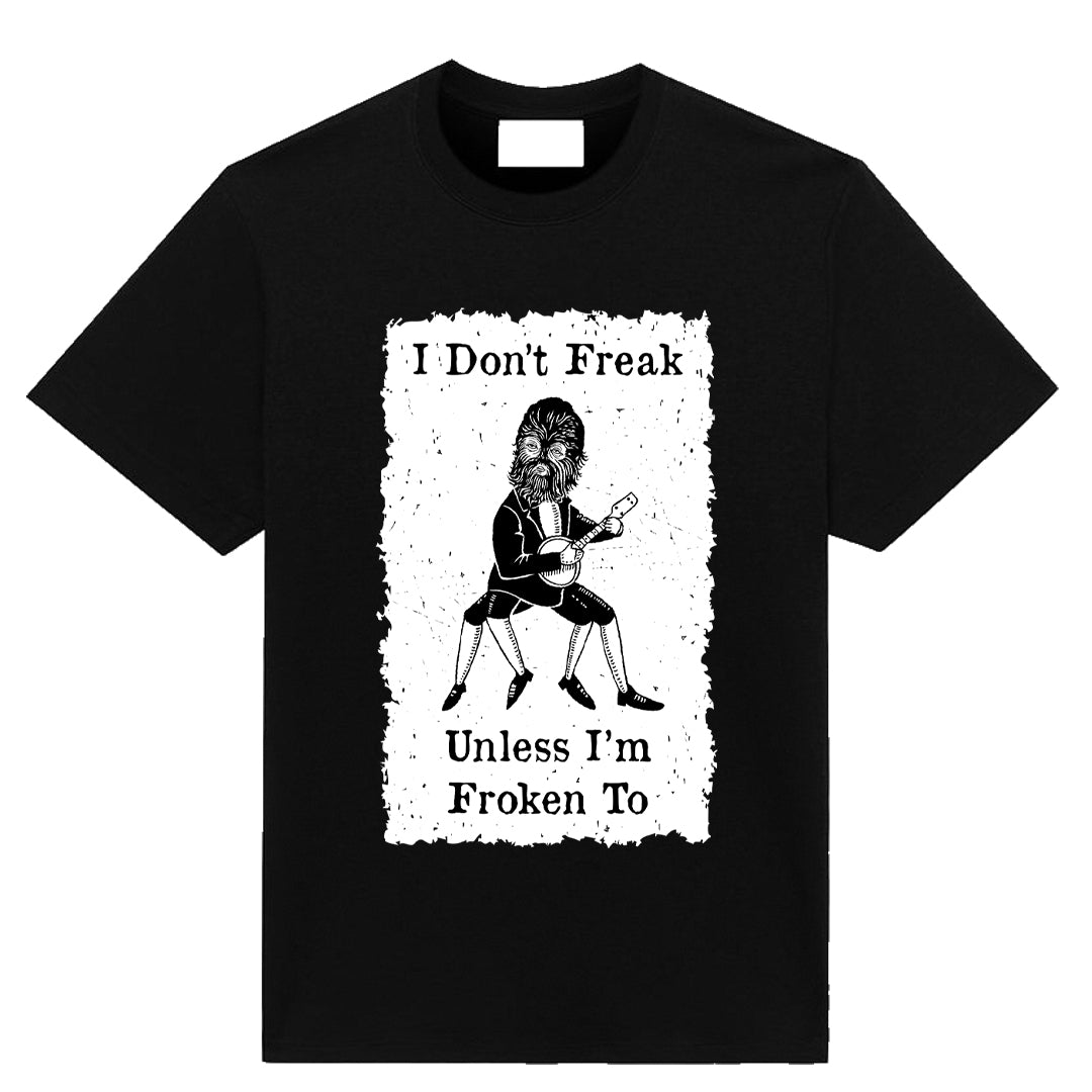 Black unisex graphic T-shirt with bold cream text reading “I Don’t Freak Unless I’m Froken To” in high-contrast statement design.